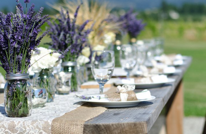 outdoor-wedding-reception-centerpieces-mason-jars-purple-wedding-flowers__full-carousel.jpg