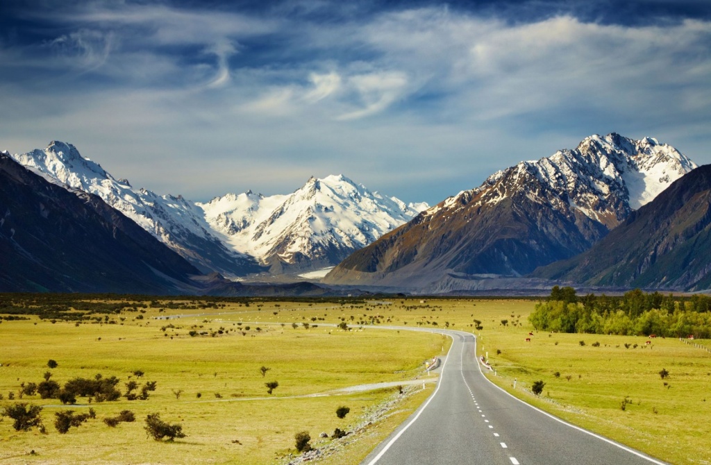Visit-New-Zealand-Landscape-With-Road-and-Snowy-Mountains-Southern-Alps-New-Zealand-1600x1047.jpg